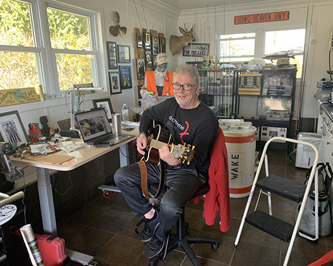 Bob playing the guitar